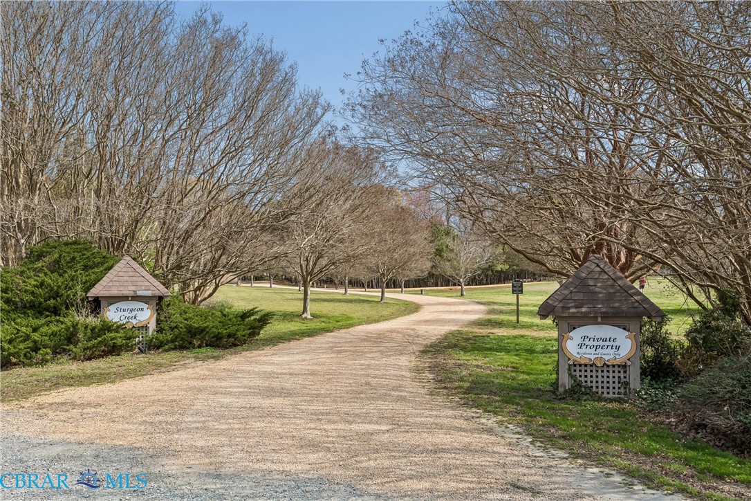 172 Sturgeon Creek Road Deltaville, VA 23043 - Photo 37 of 50 View of community featuring view of wooded area
