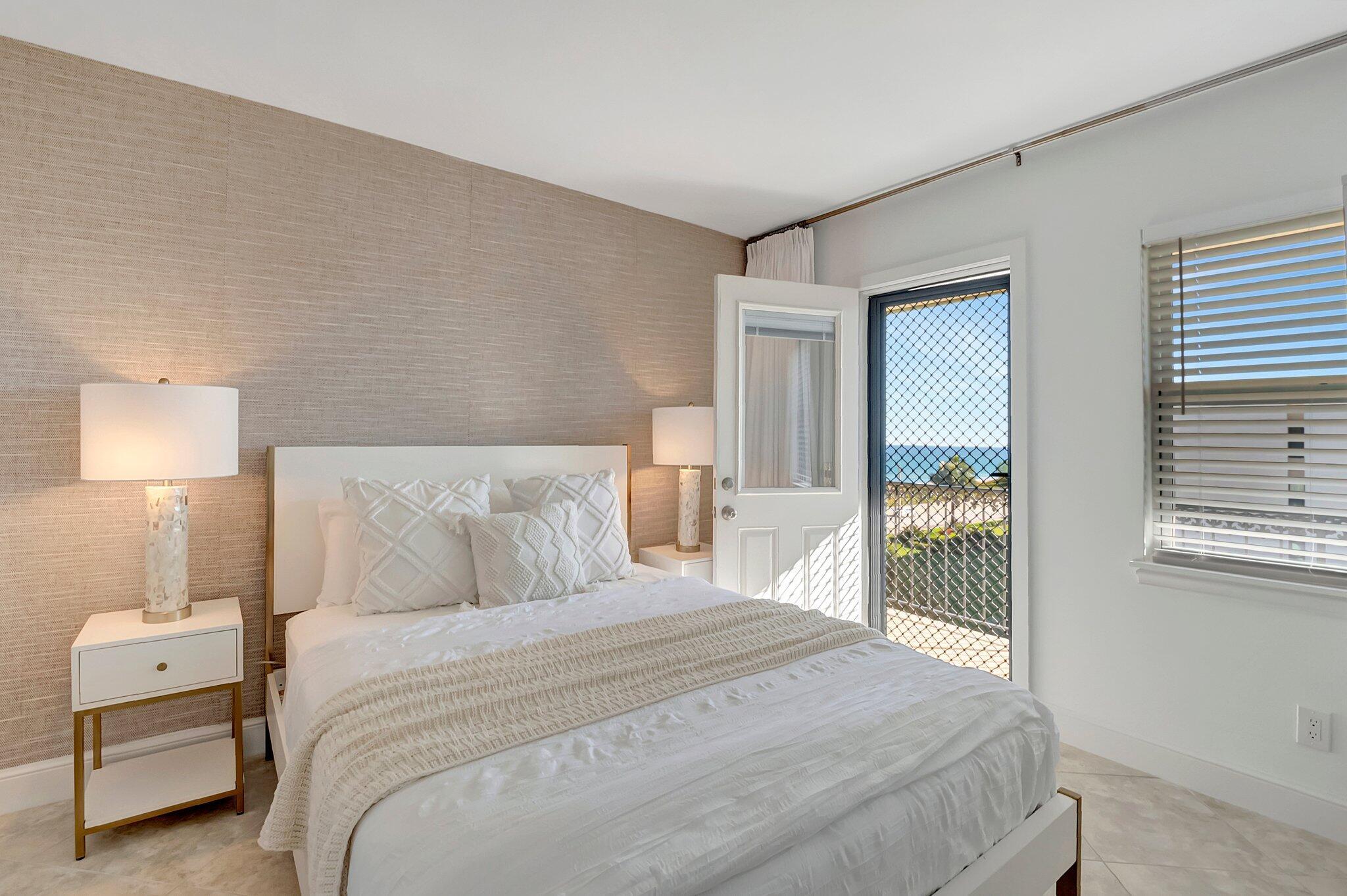 2871 North Ocean Boulevard, Unit D506 Boca Raton, FL 33431 - Photo 13 of 19 Queen Size Bed - Door to Ocean View