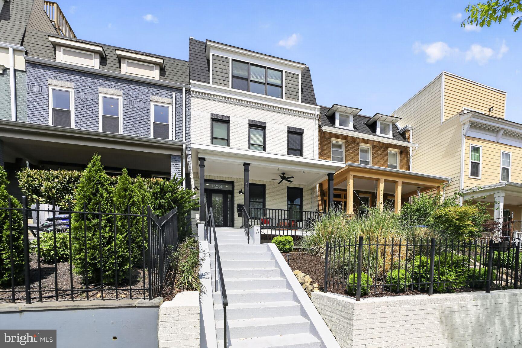 1232 I Street Northeast, Unit 1 Washington, DC 20002 - Photo 2 of 59 Charming row homes with lush greenery.