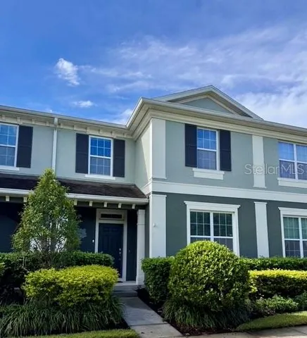 a large kitchen with stainless steel appliances lots of counter space cabinets and a sink