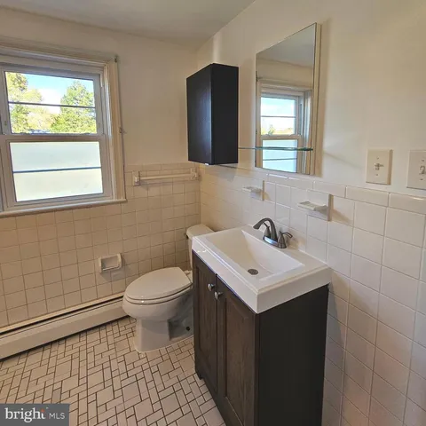 a view of a kitchen with furniture and a kitchen