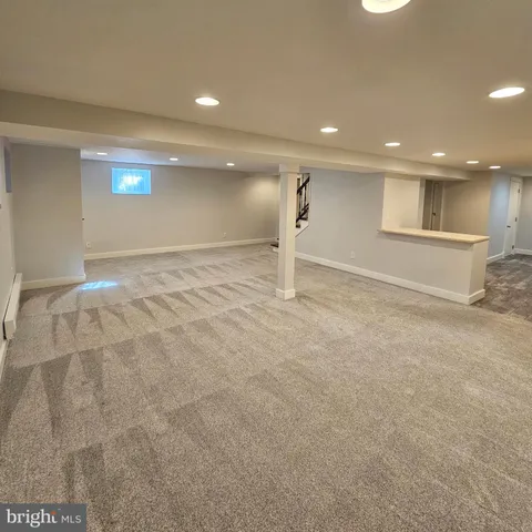 a view of a kitchen from the hallway