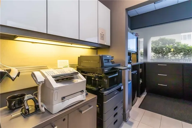a kitchen with a stove and a microwave