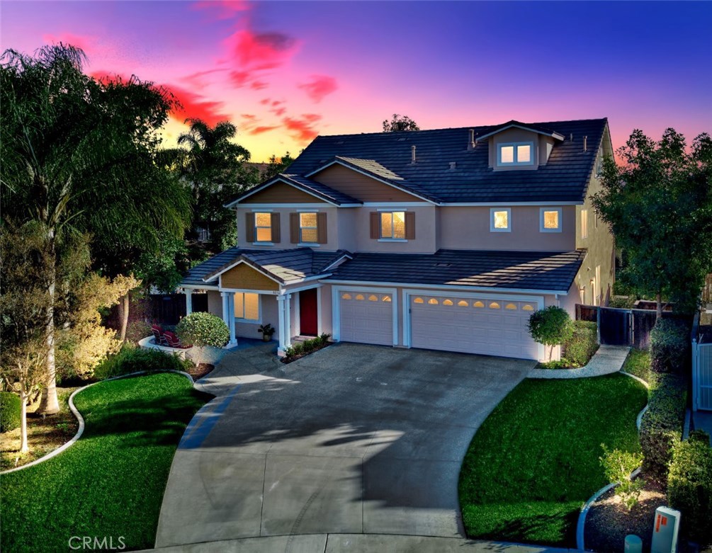 8036 Ralston Place Riverside, CA 92508 - Photo 1 of 1 a view of a house with a yard and potted plants