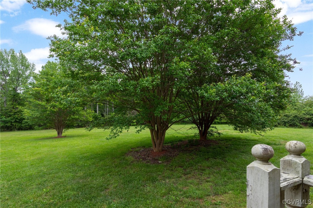 3151 Three Chopt Road Gum Spring, VA 23065 - Photo 27 of 38 a backyard of a house with barbeque oven table and chairs
