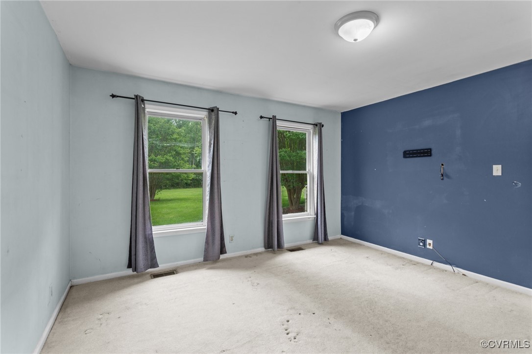 3151 Three Chopt Road Gum Spring, VA 23065 - Photo 7 of 38 an empty room with windows and view