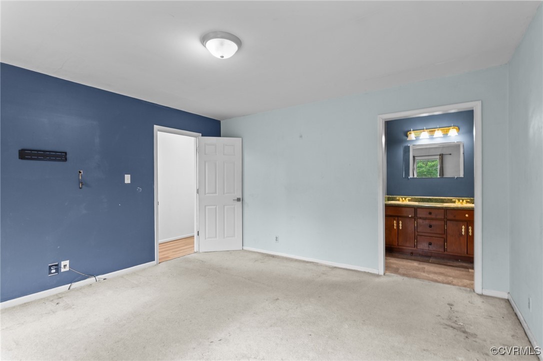 3151 Three Chopt Road Gum Spring, VA 23065 - Photo 8 of 38 a view of an empty room and room with a bathroom