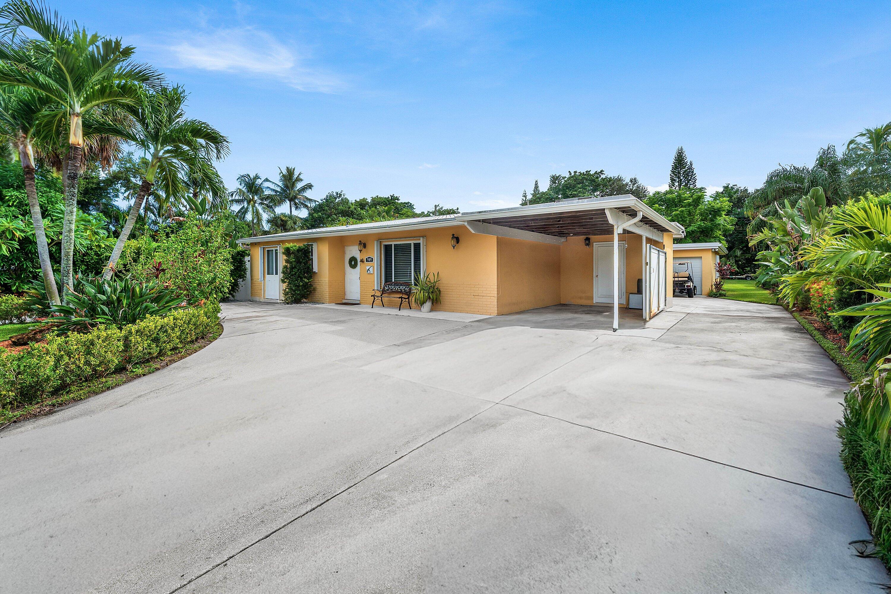 949 Laurel Road North Palm Beach, FL 33408 - Photo 39 of 53 Side of House