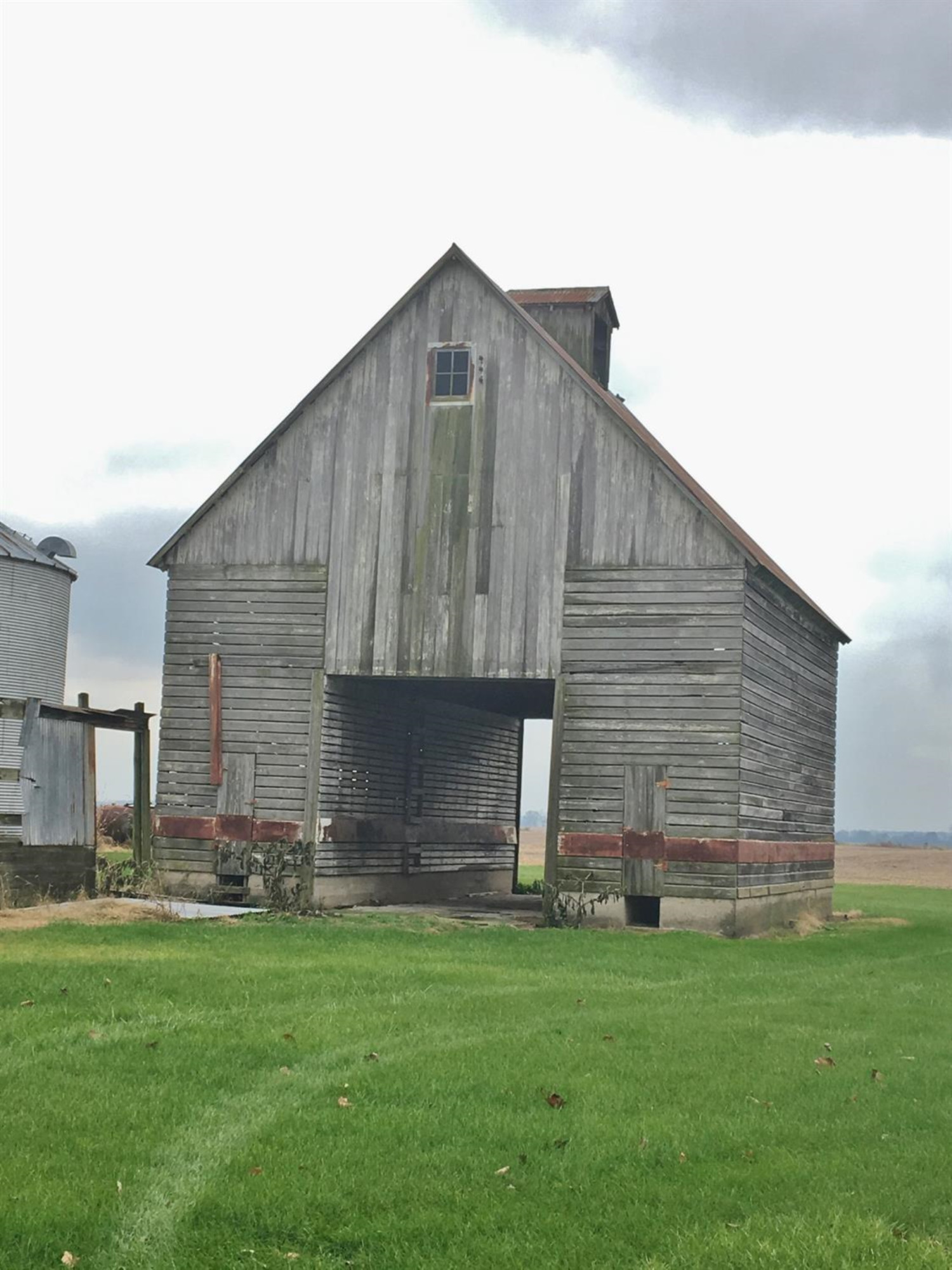 -58 Acres West Mt Calvary Road Rensselaer, IN 47978 - Photo 2 of 5 a tall brick building with a yard