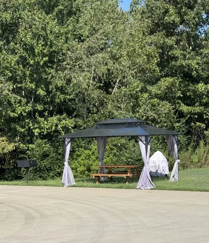 a view of a garden from a balcony