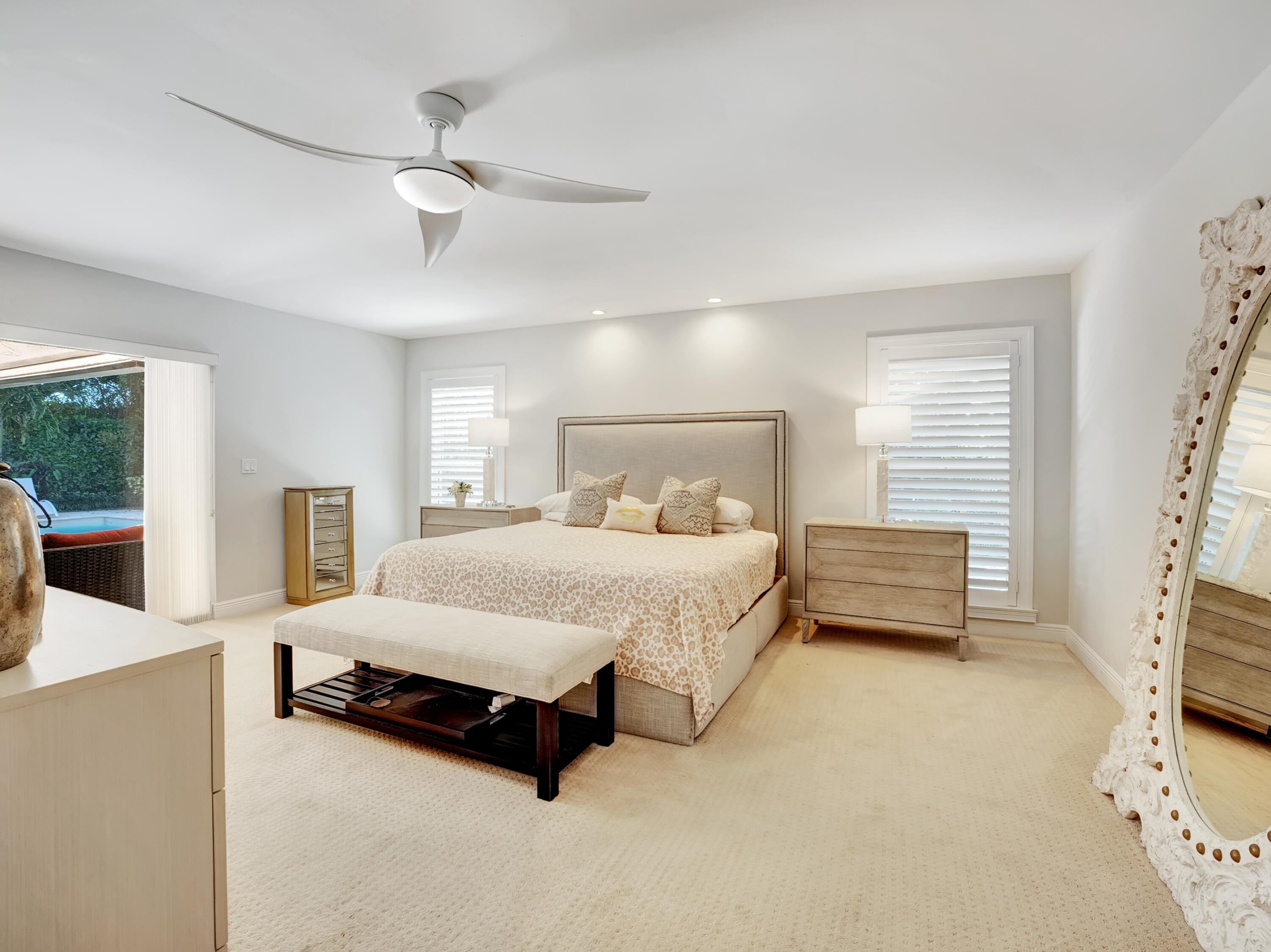 4550 White Cedar Lane Delray Beach, FL 33445 - Photo 17 of 38 a spacious bedroom with a bed and a window