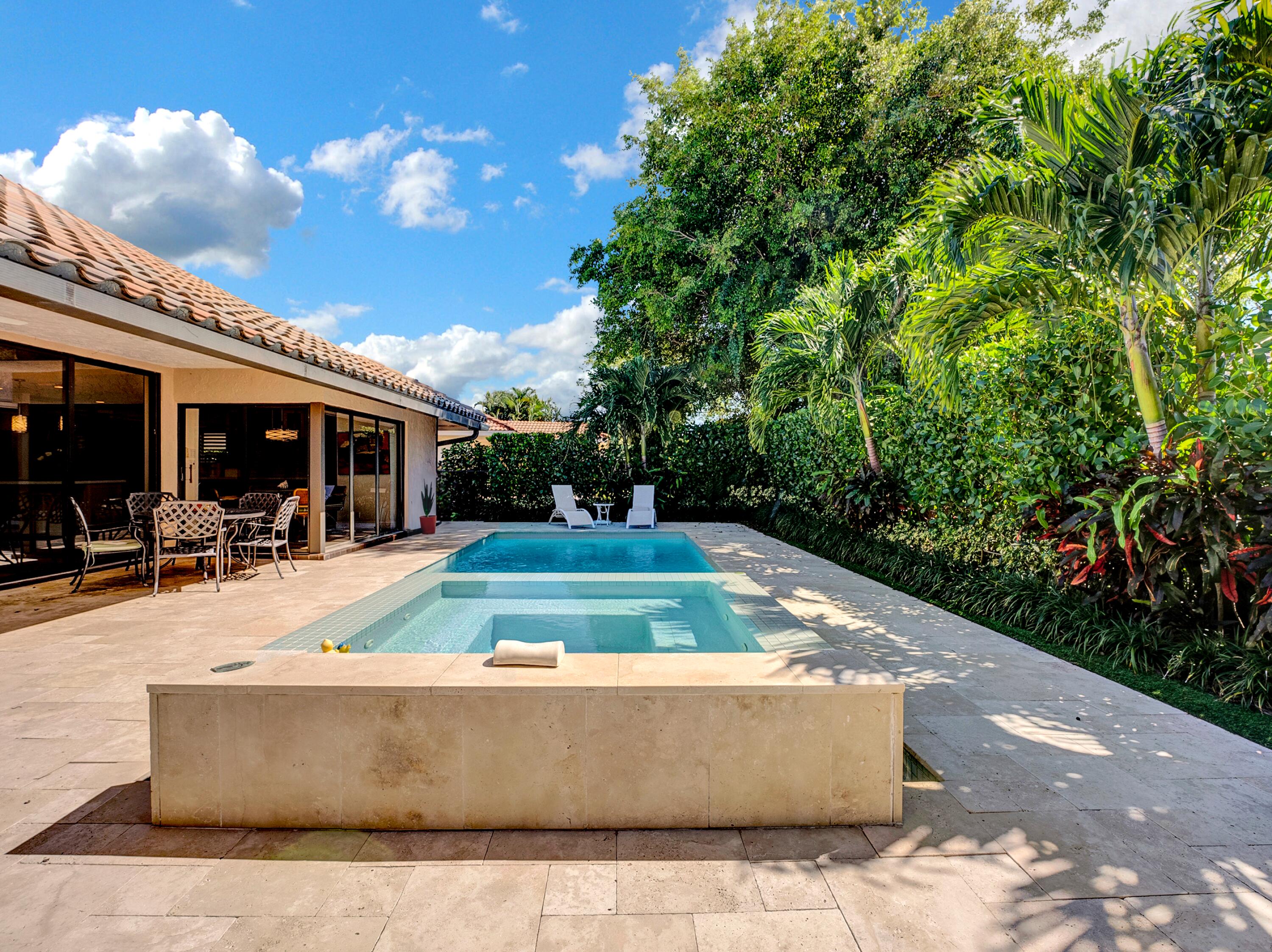 4550 White Cedar Lane Delray Beach, FL 33445 - Photo 3 of 38 a view of outdoor space yard swimming pool and patio