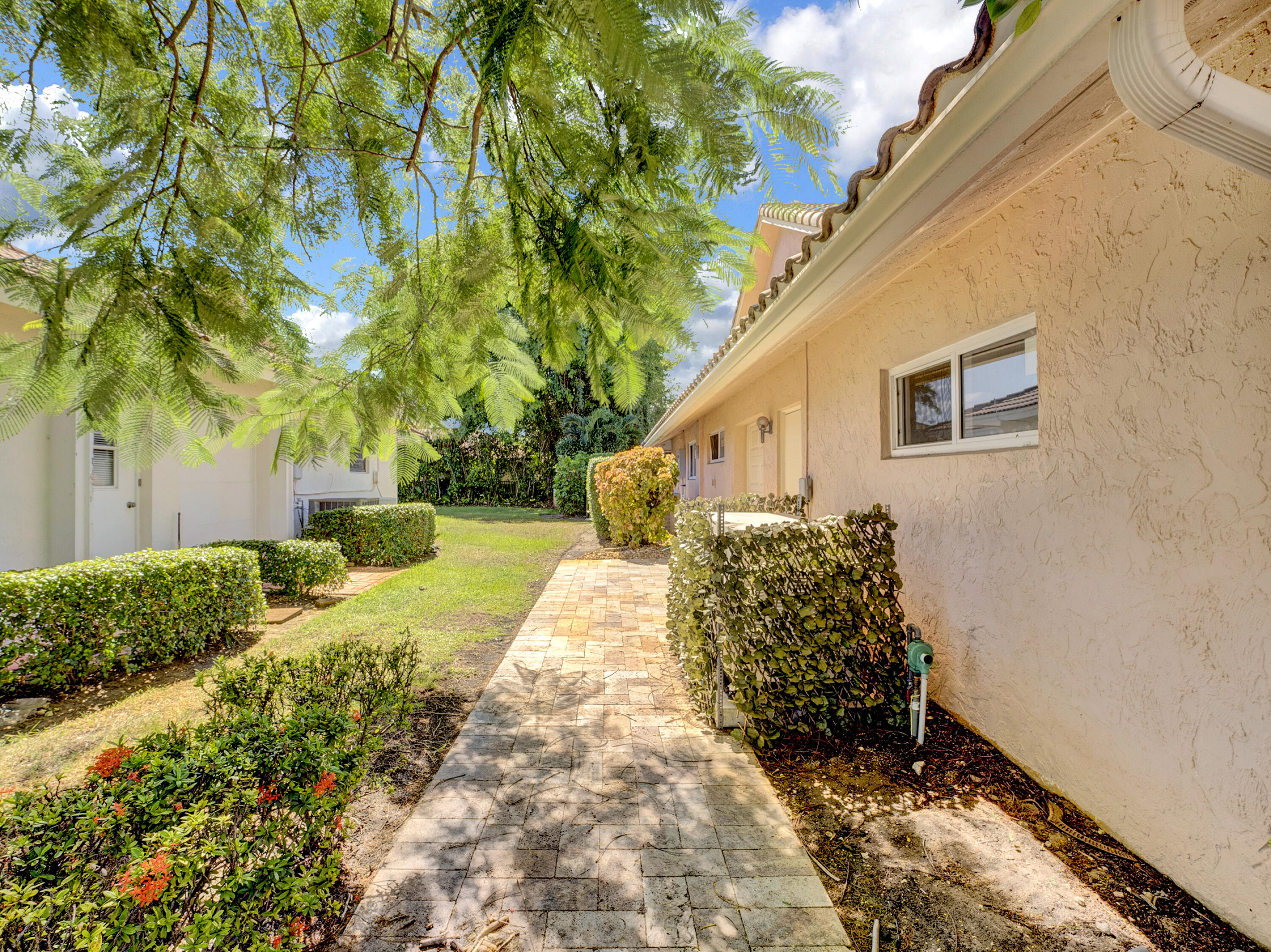 4550 White Cedar Lane Delray Beach, FL 33445 - Photo 35 of 38 a house with a yard