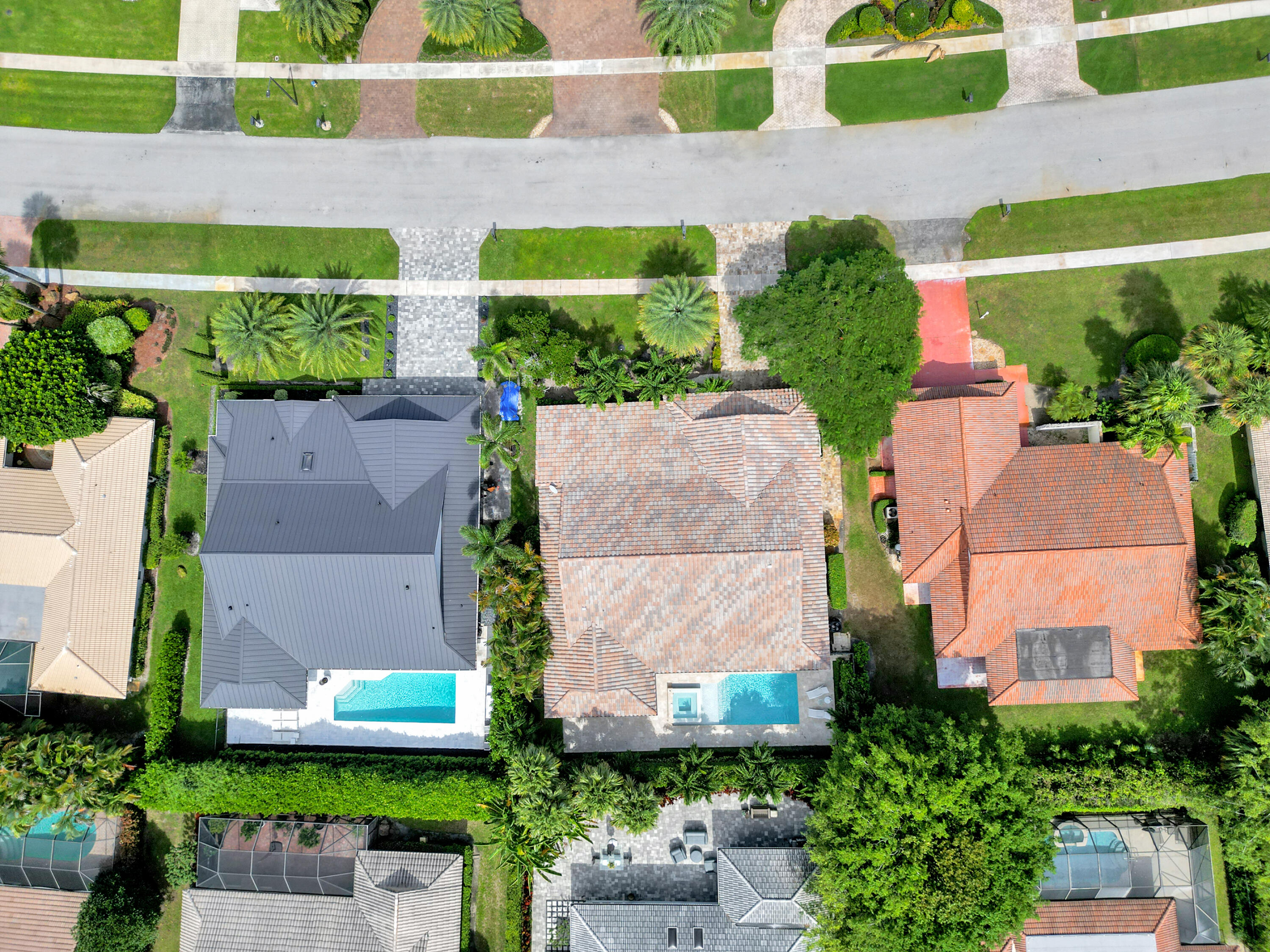 4550 White Cedar Lane Delray Beach, FL 33445 - Photo 38 of 38 an aerial view of multiple houses with a yard