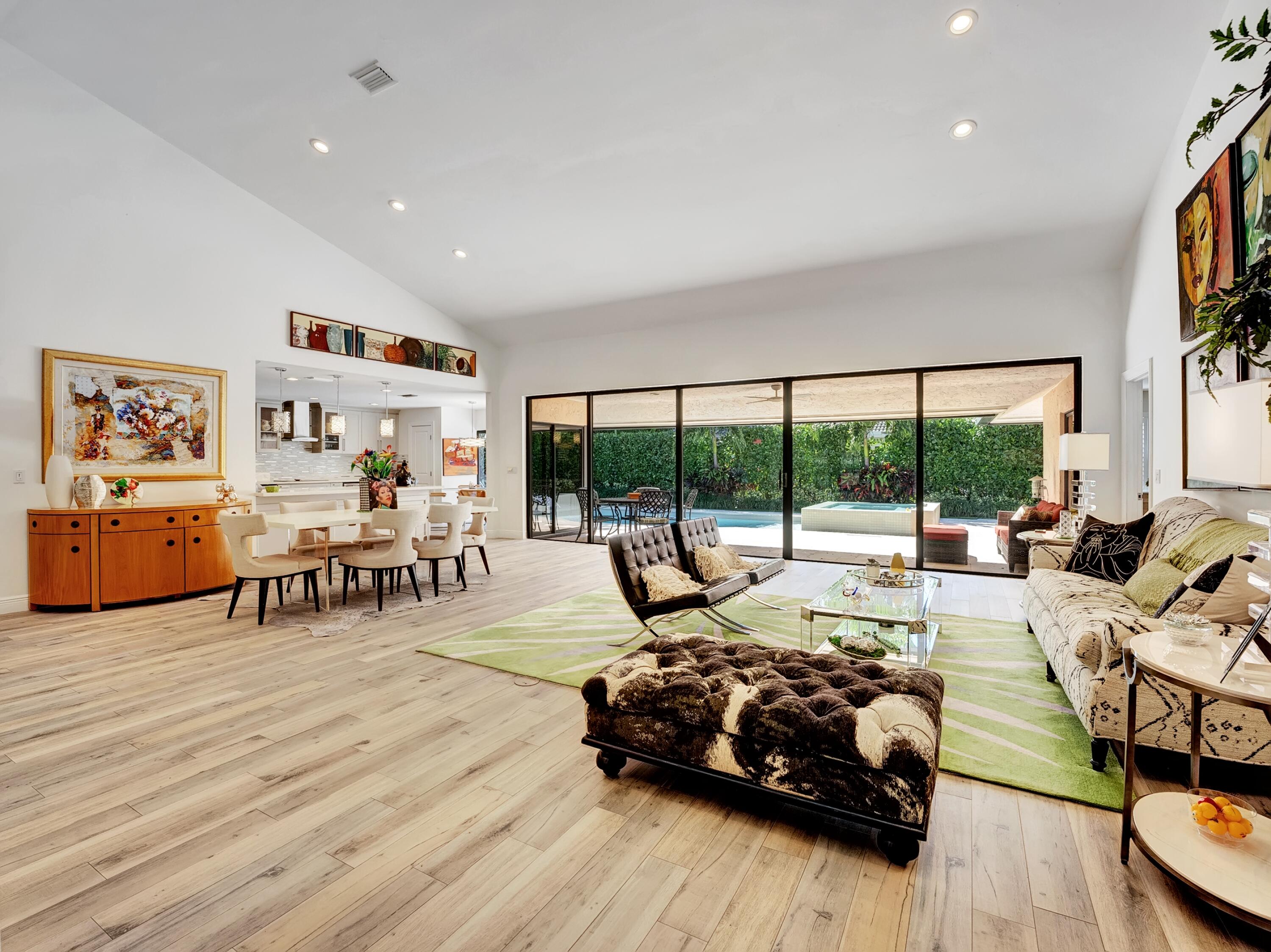 4550 White Cedar Lane Delray Beach, FL 33445 - Photo 8 of 38 a living room with furniture and a large window