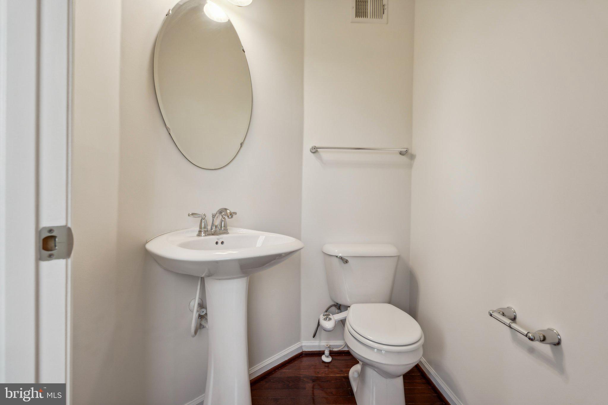 6912 Red Clay Forge, Unit 2 Elkridge, MD 21075 - Photo 12 of 46 a bathroom with a sink and a toilet