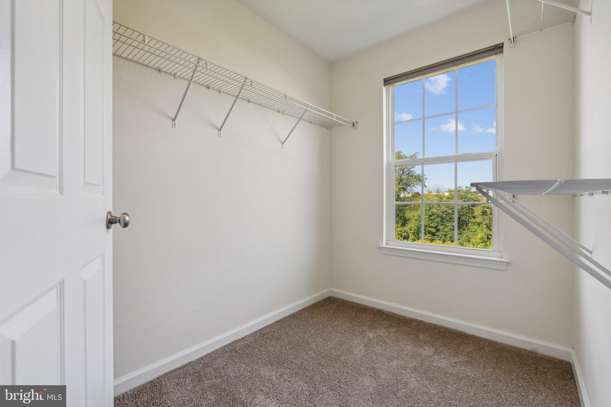 6912 Red Clay Forge, Unit 2 Elkridge, MD 21075 - Photo 17 of 46 a view of a small space with window