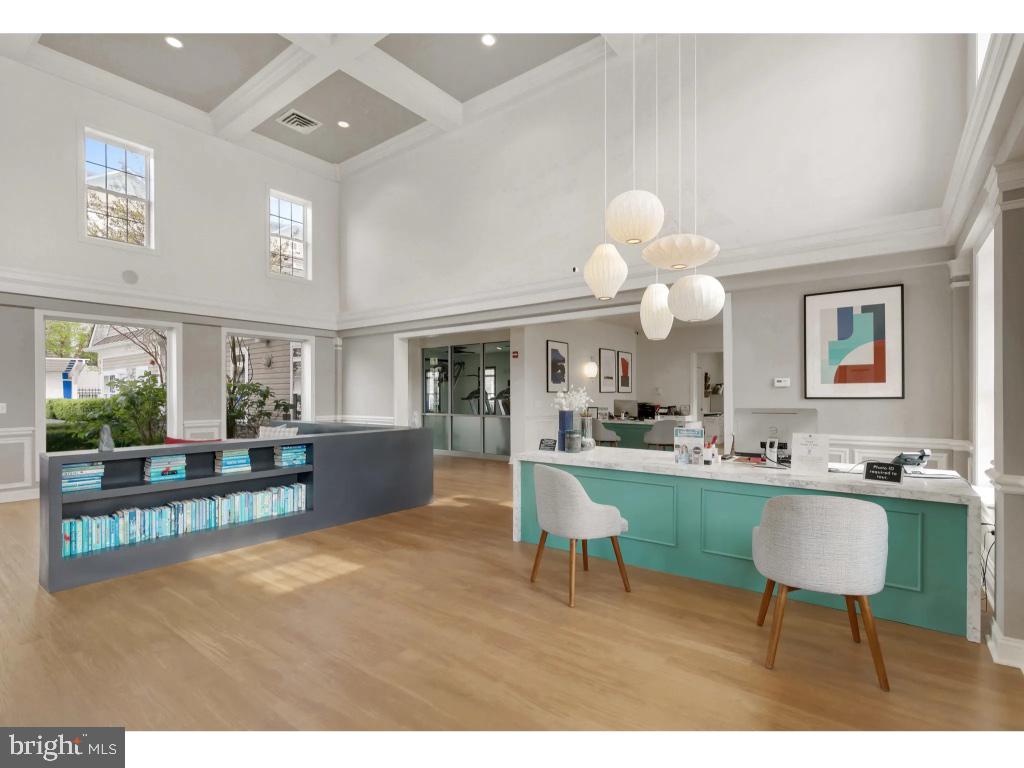 6912 Red Clay Forge, Unit 2 Elkridge, MD 21075 - Photo 40 of 46 a view of a dining room with furniture