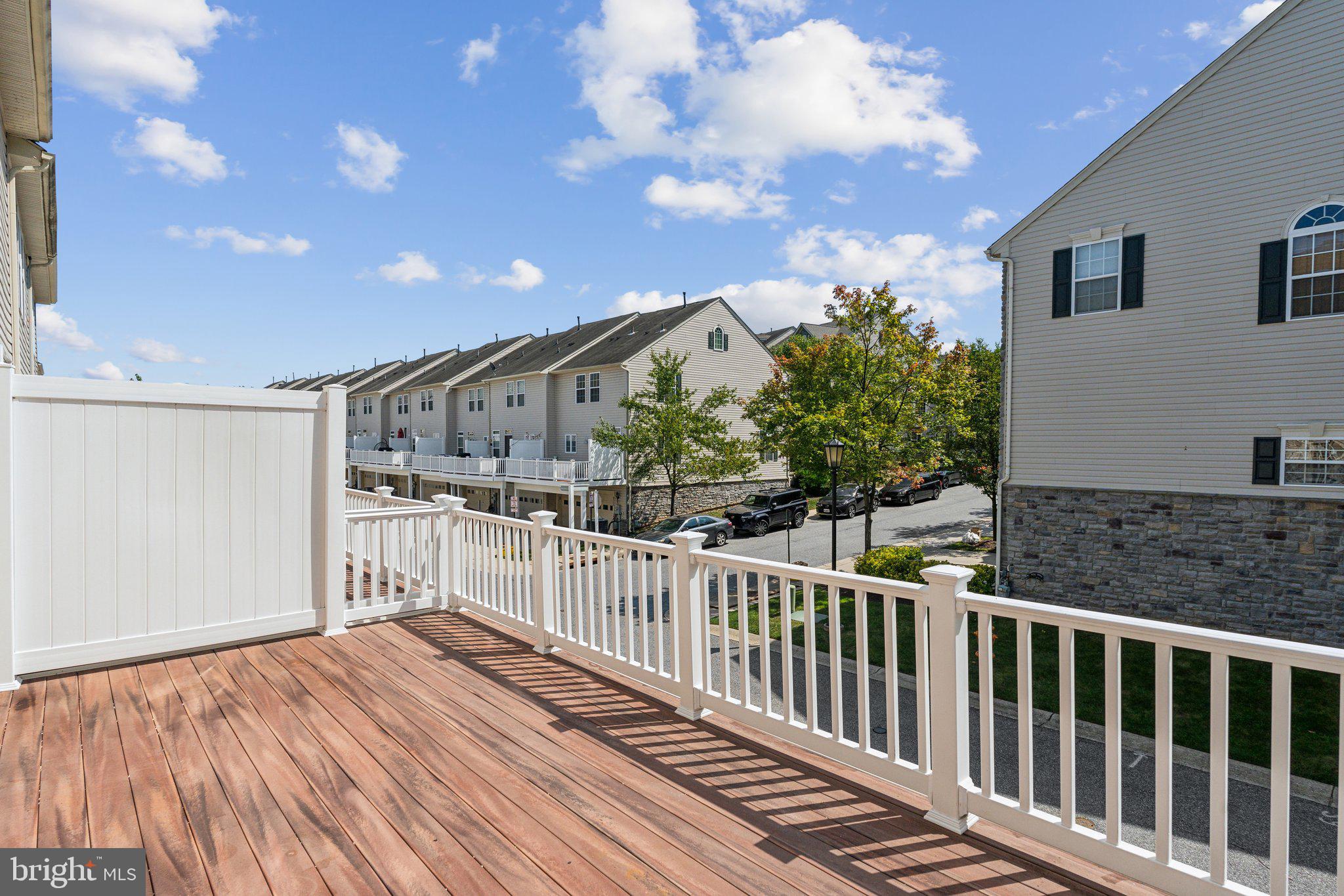 6912 Red Clay Forge, Unit 2 Elkridge, MD 21075 - Photo 4 of 46 a view of a house with backyard and porch