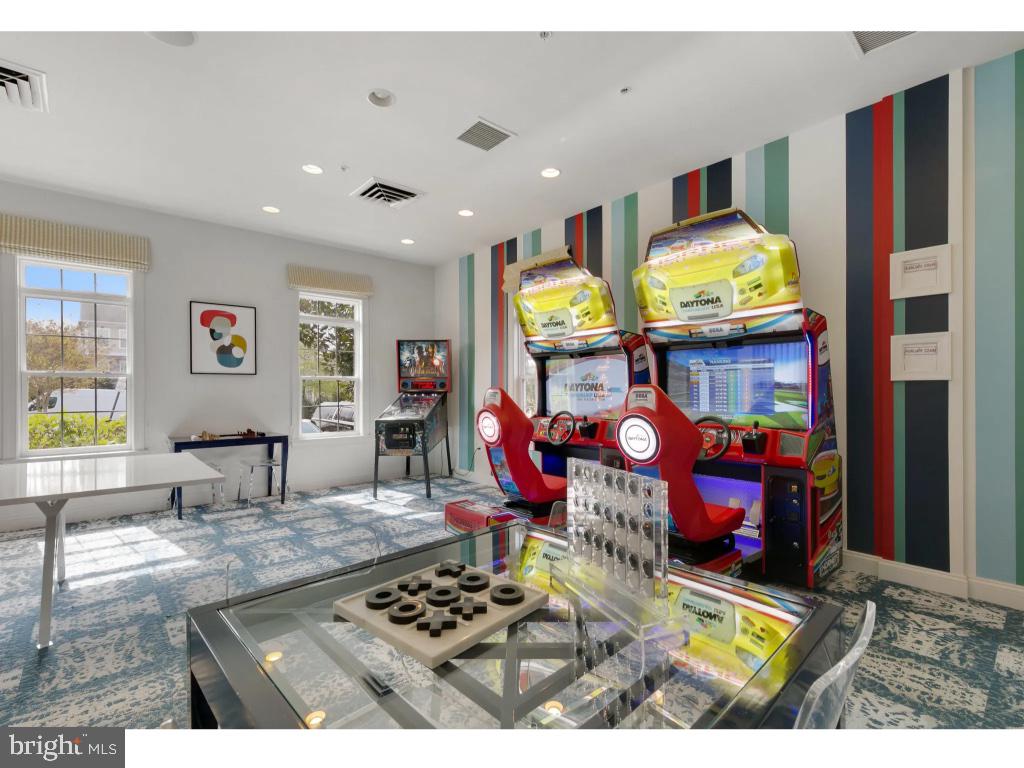 6912 Red Clay Forge, Unit 2 Elkridge, MD 21075 - Photo 46 of 46 a living room with fireplace furniture and a flat screen tv