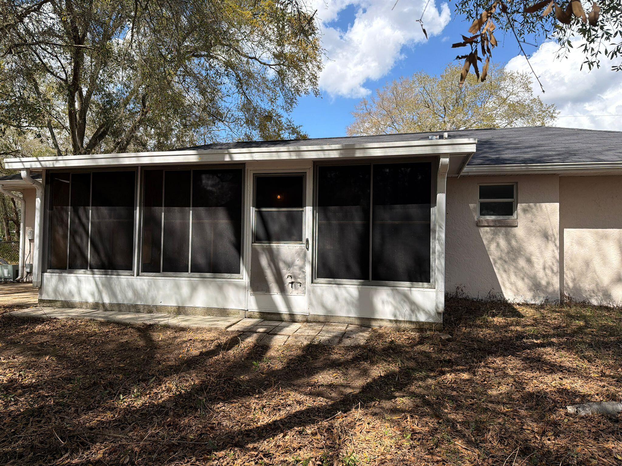 3920 East Allendale Street Inverness, FL 34453 - Photo 10 of 26 a view of a house with a yard