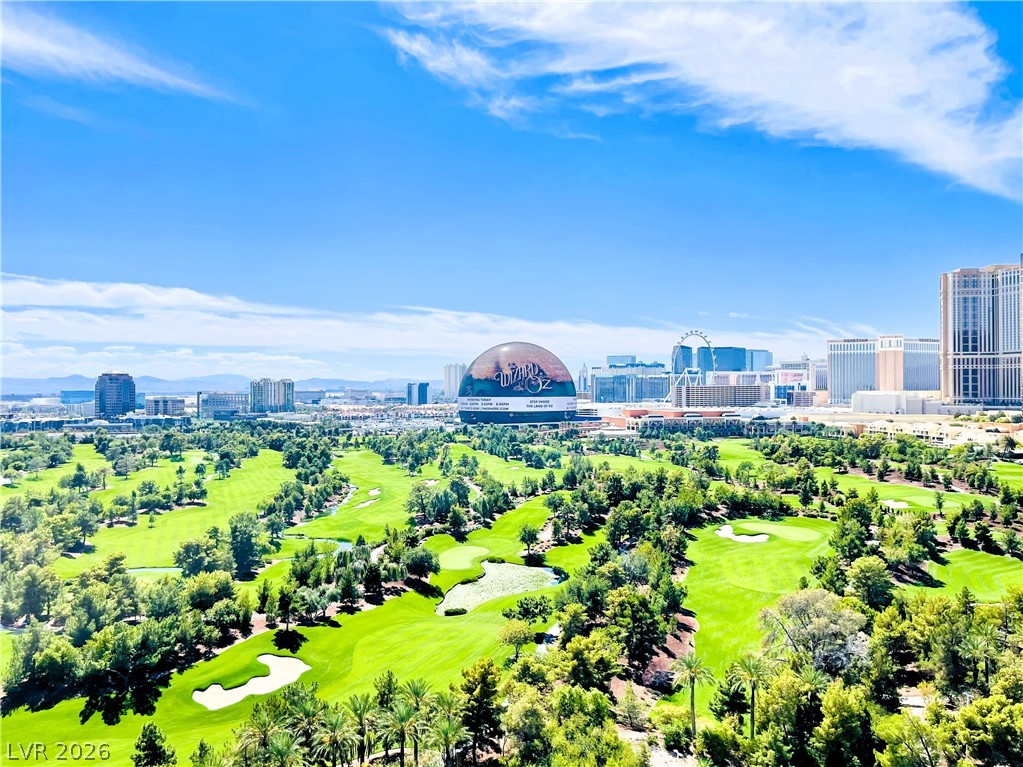 360 East Desert Inn Road, Unit 507 Las Vegas, NV 89109 - Photo 37 of 37 Incredible city and golf course vistas unfold under a wide blue sky.