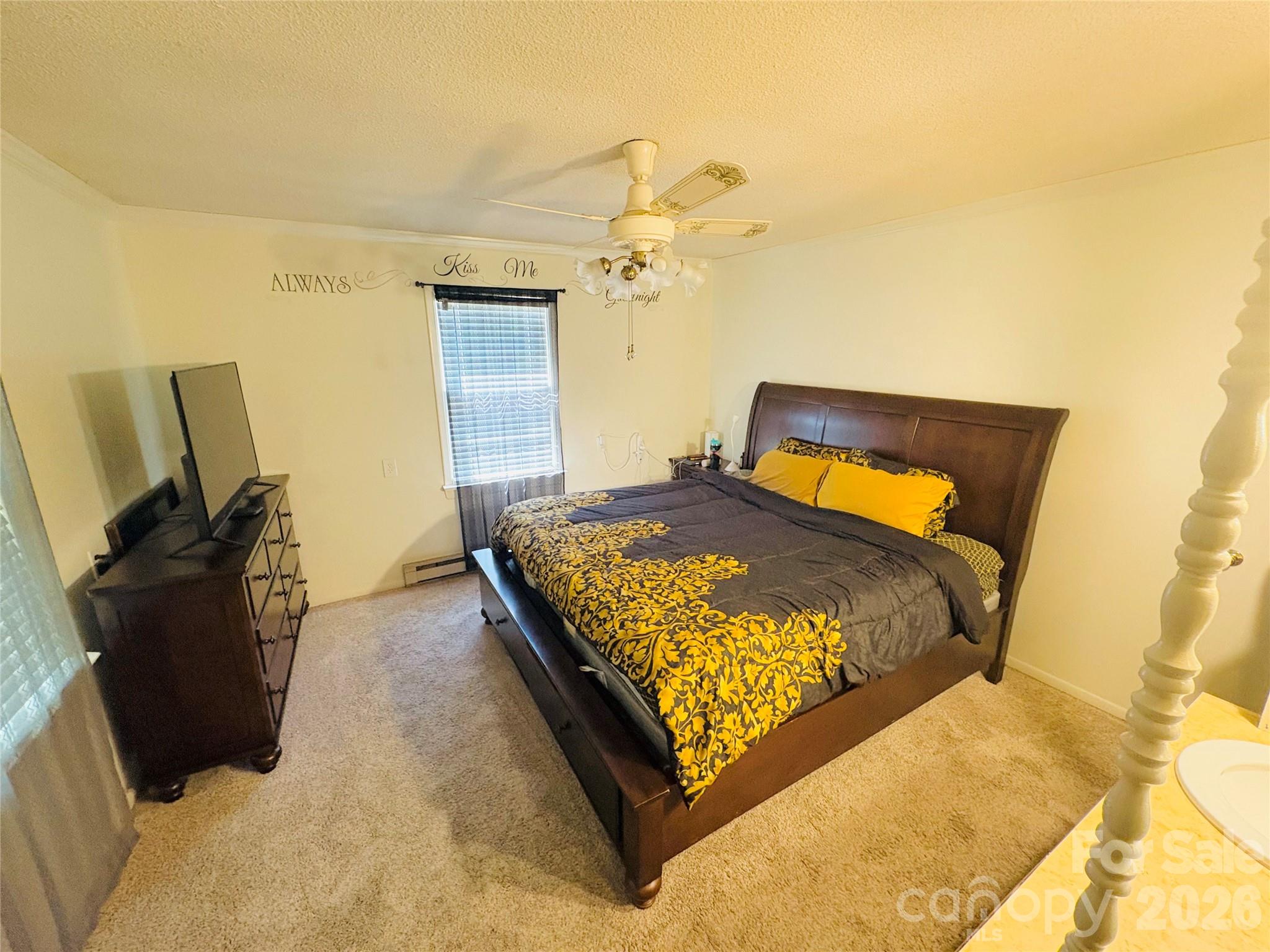 1481 Grace Avenue Lancaster, SC 29720 - Photo 12 of 22 a bedroom with a bed and wooden floor