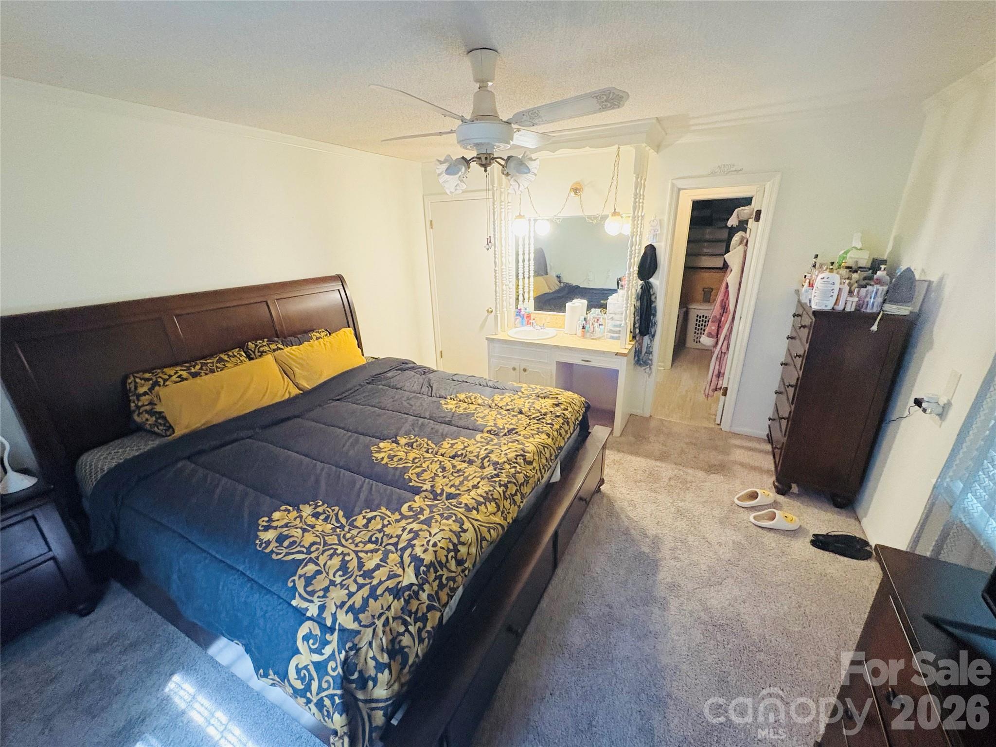 1481 Grace Avenue Lancaster, SC 29720 - Photo 13 of 22 a bed sitting in a bedroom and a mirror