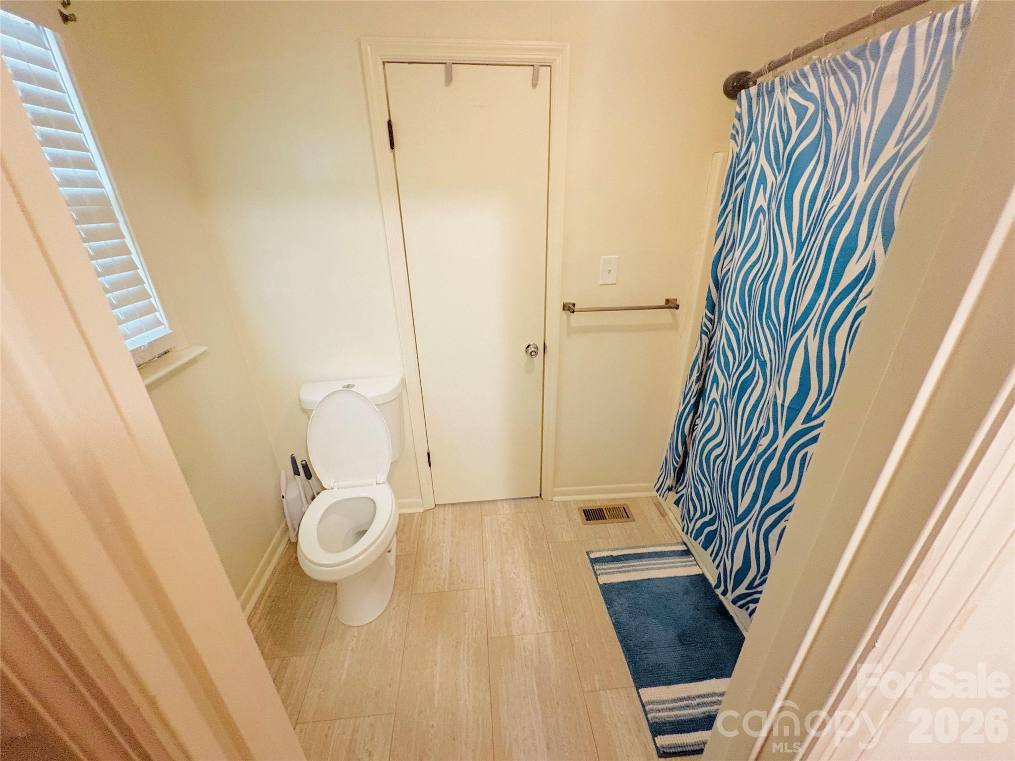 1481 Grace Avenue Lancaster, SC 29720 - Photo 14 of 22 a bathroom with a sink and a mirror