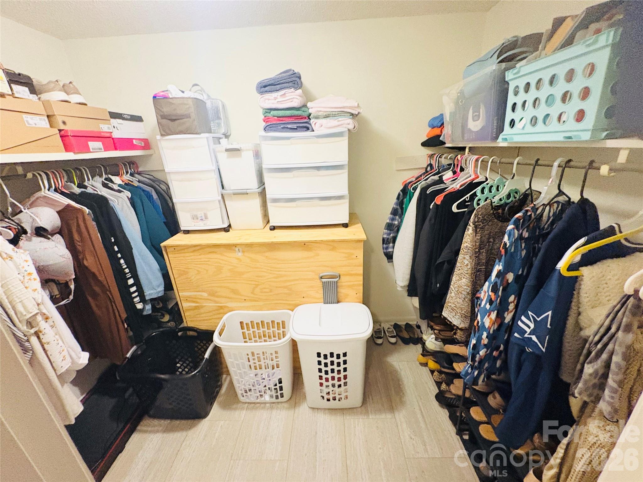 1481 Grace Avenue Lancaster, SC 29720 - Photo 15 of 22 a view of walk in closet with clothes and shoes