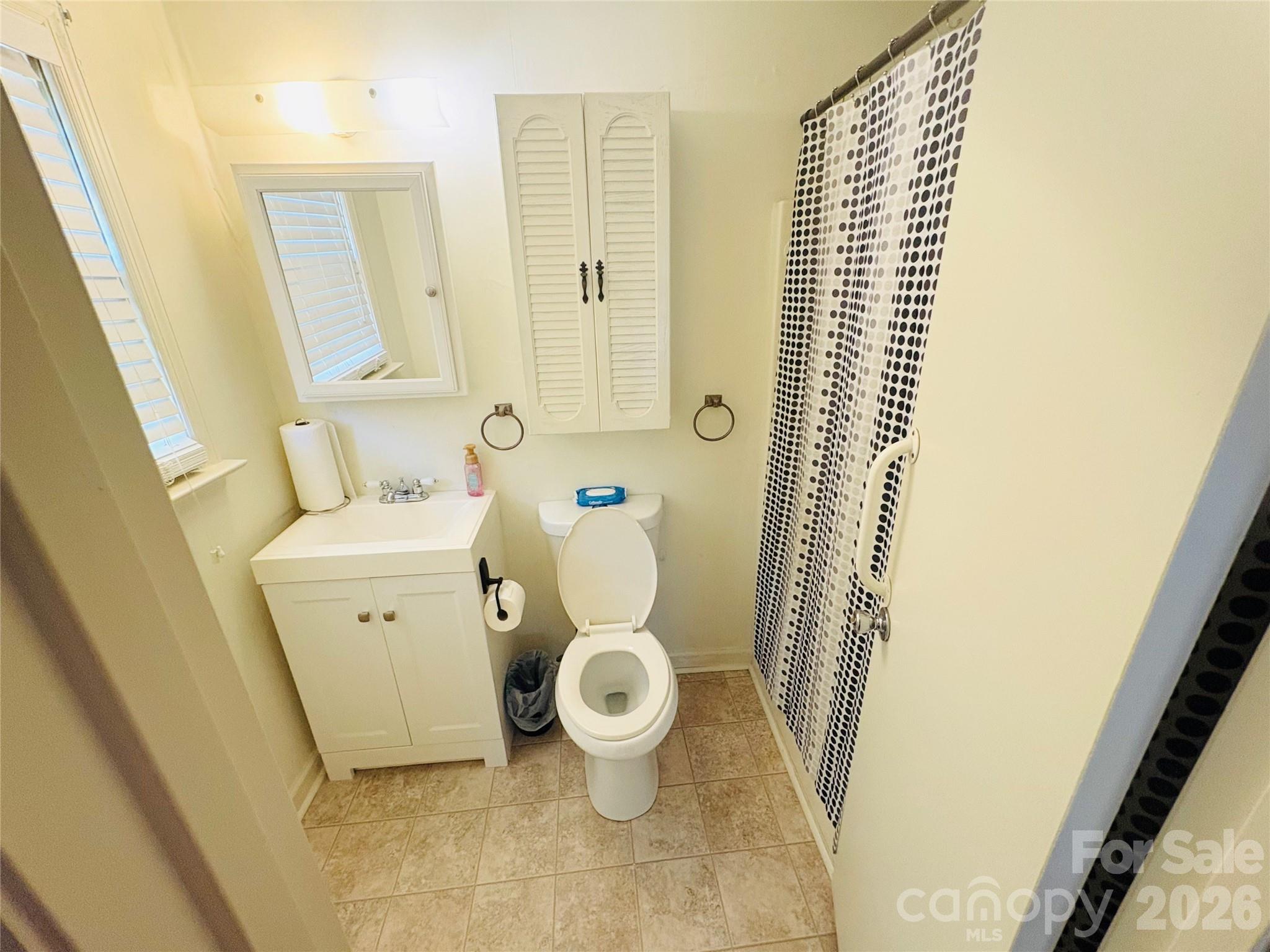1481 Grace Avenue Lancaster, SC 29720 - Photo 18 of 22 a bathroom with a sink and toilet