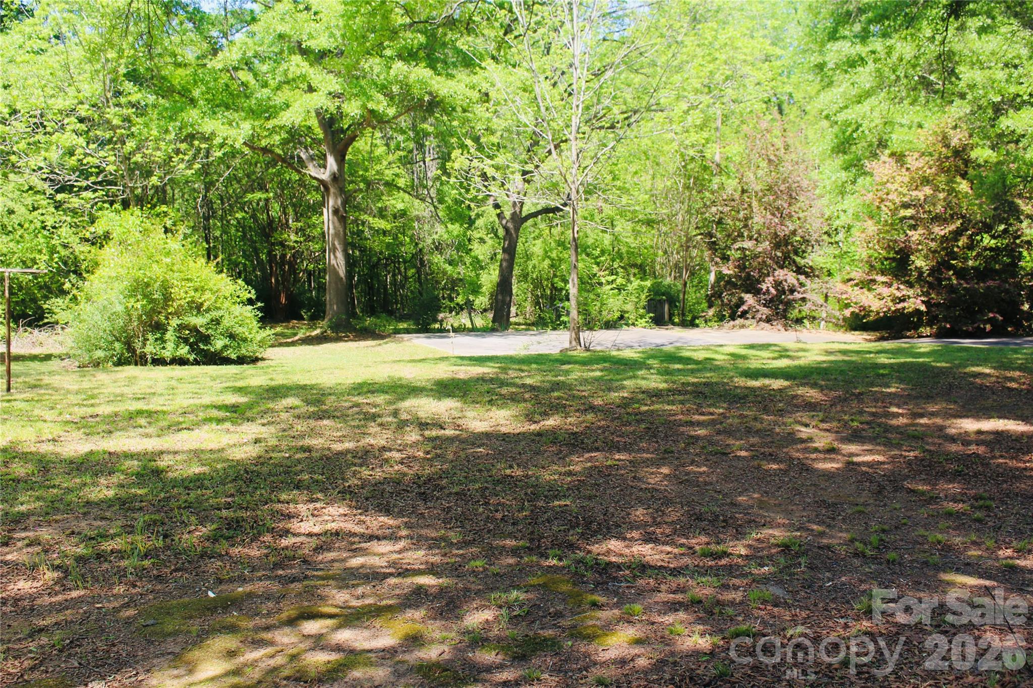 1481 Grace Avenue Lancaster, SC 29720 - Photo 5 of 22 a view of a field with trees in the background
