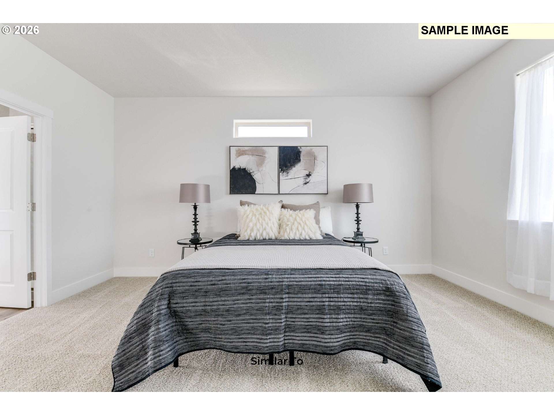 215 Southwest Sparrow Street Boardman, OR 97818 - Photo 17 of 28 a bedroom with a bed and window