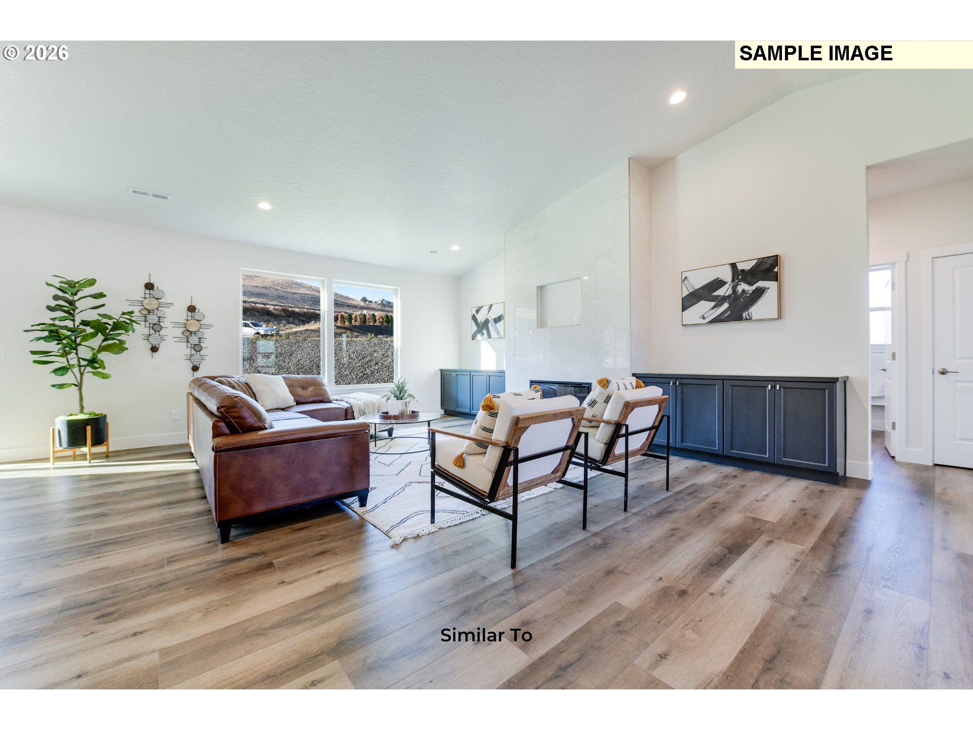 215 Southwest Sparrow Street Boardman, OR 97818 - Photo 24 of 28 a living room with furniture and wooden floor