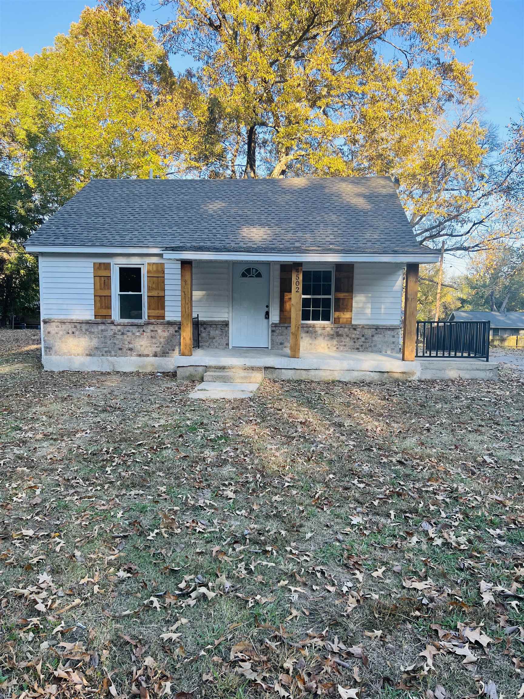 4502 Weaver Road Memphis, TN 38109 - Photo 1 of 12 a front view of a house with yard