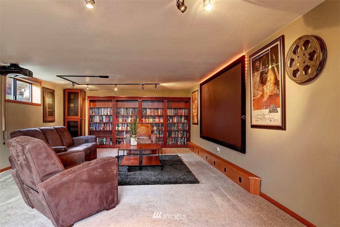 17041 Talbot Road Edmonds, WA 98026 - Photo 12 of 25 a living room with furniture a ceiling fan and a window