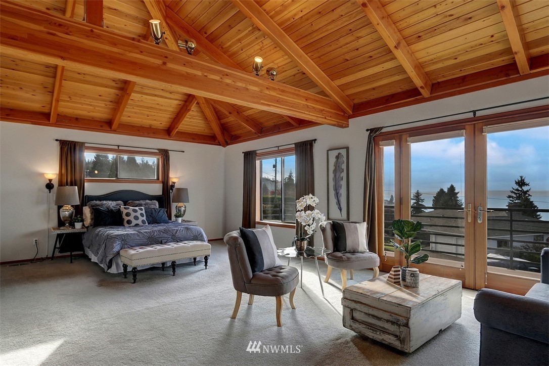 17041 Talbot Road Edmonds, WA 98026 - Photo 3 of 25 a living room with furniture and a large window