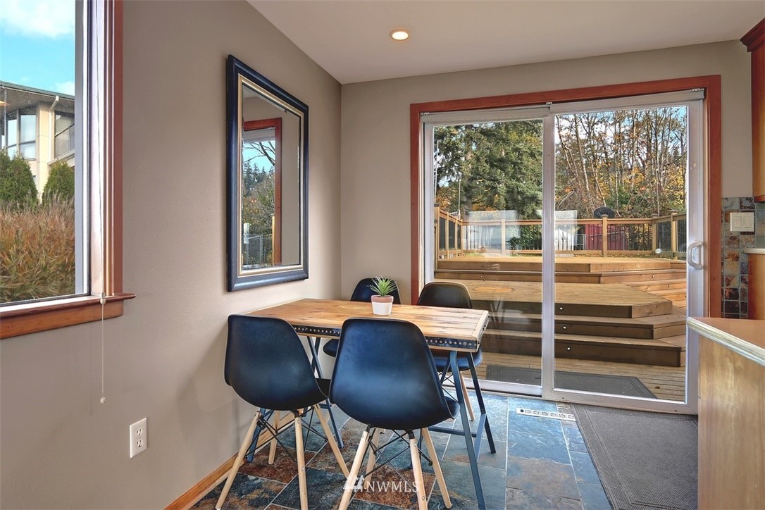 17041 Talbot Road Edmonds, WA 98026 - Photo 21 of 25 a view of a dining room with furniture window and outside view