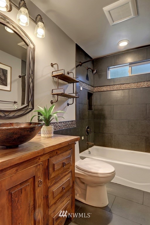 17041 Talbot Road Edmonds, WA 98026 - Photo 8 of 25 a bathroom with a sink a toilet and shower