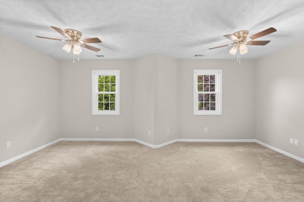 3525 Magnolia Walk Trail Cumming, GA 30040 - Photo 17 of 31 a view of an empty room with a window