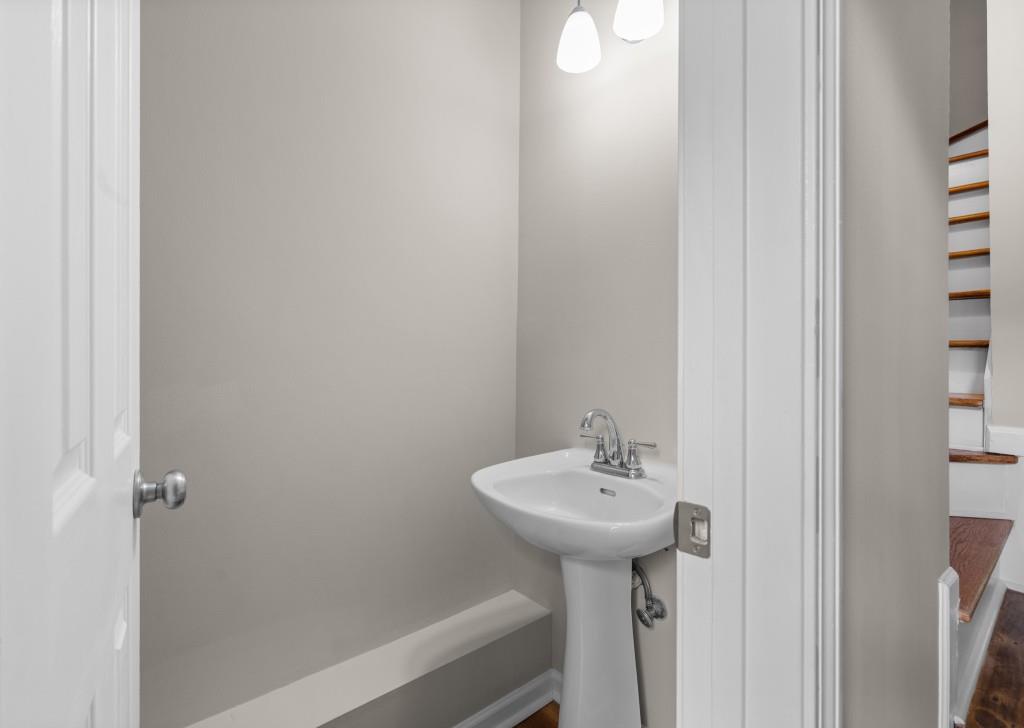 3525 Magnolia Walk Trail Cumming, GA 30040 - Photo 20 of 31 a bathroom with a sink and a mirror