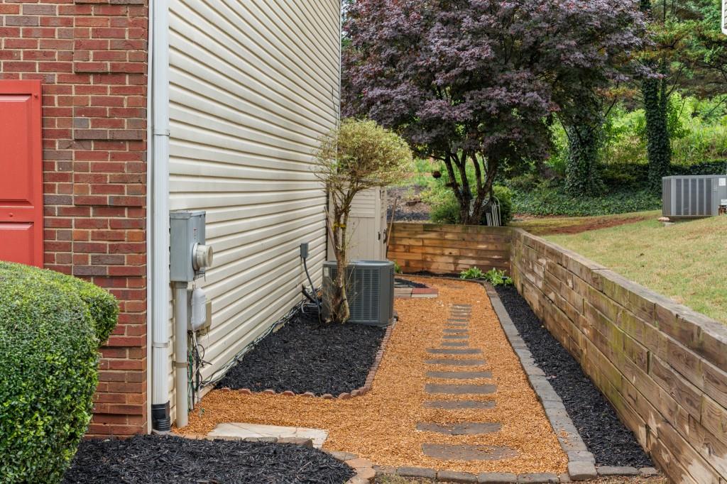 3525 Magnolia Walk Trail Cumming, GA 30040 - Photo 21 of 31 a view of a pathway with a patio