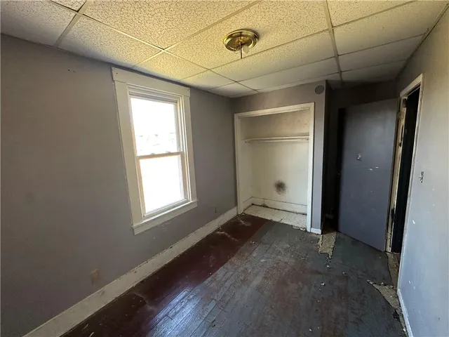 a view of an empty room and window