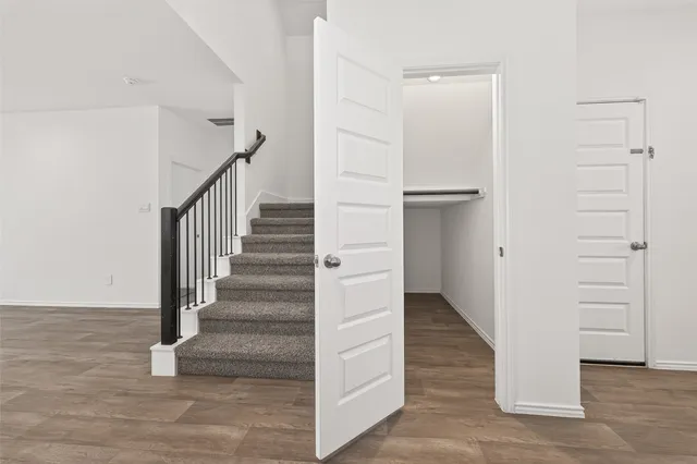 a view of entryway with wooden floor