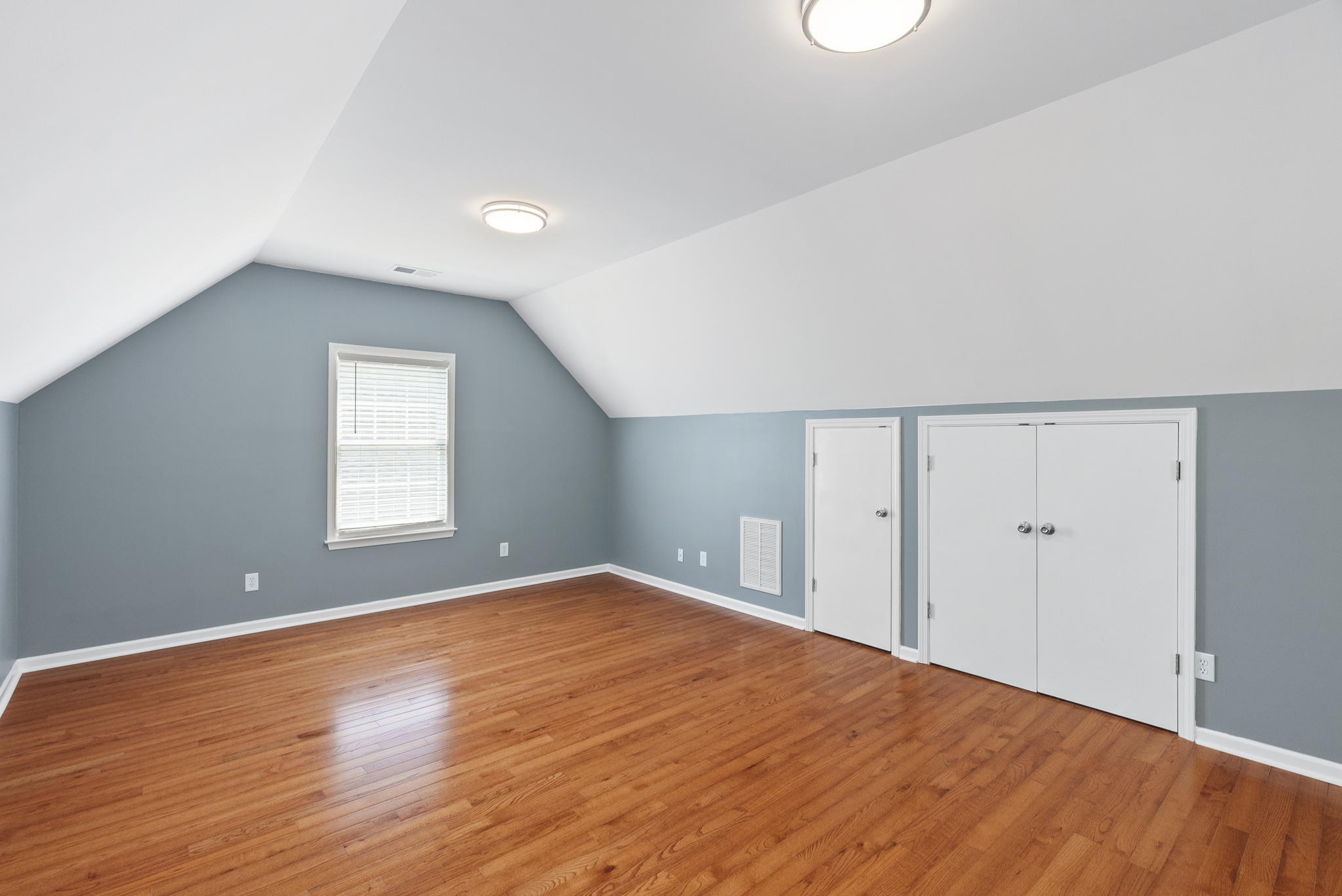 5298 Ridge Road Joelton, TN 37080 - Photo 27 of 46 a view of an empty room with wooden floor and a window