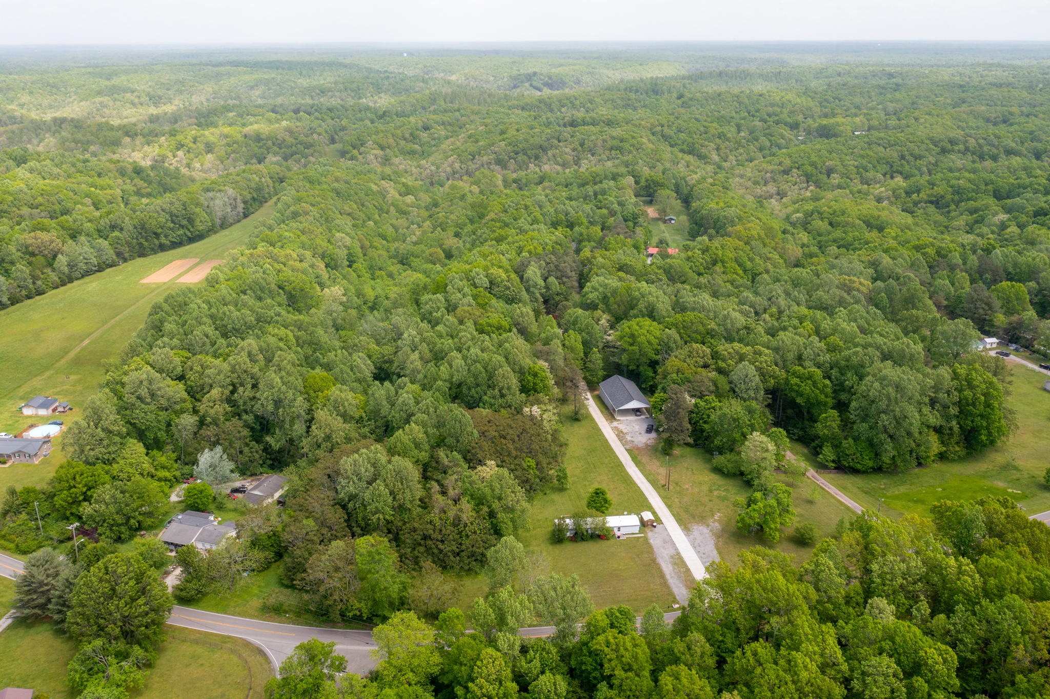 5298 Ridge Road Joelton, TN 37080 - Photo 3 of 46 a view of a city with lush green forest