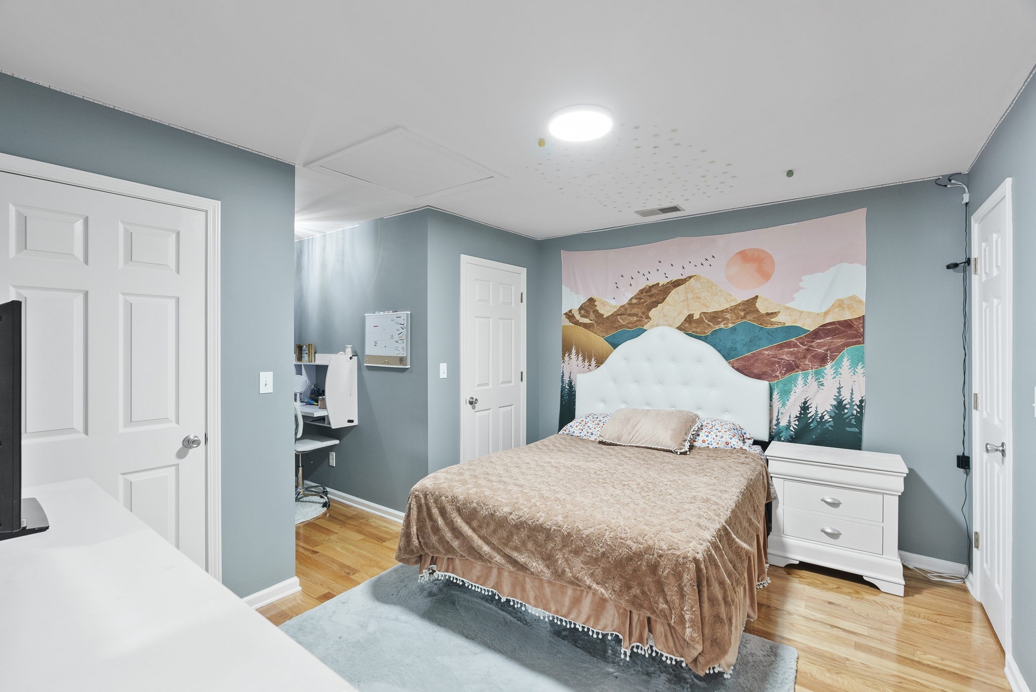 5298 Ridge Road Joelton, TN 37080 - Photo 35 of 46 a bedroom with a bed and wooden floor