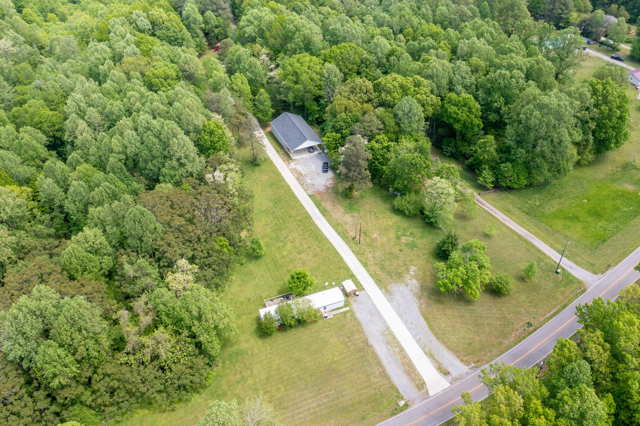 5298 Ridge Road Joelton, TN 37080 - Photo 45 of 46 a view of a yard with two plants