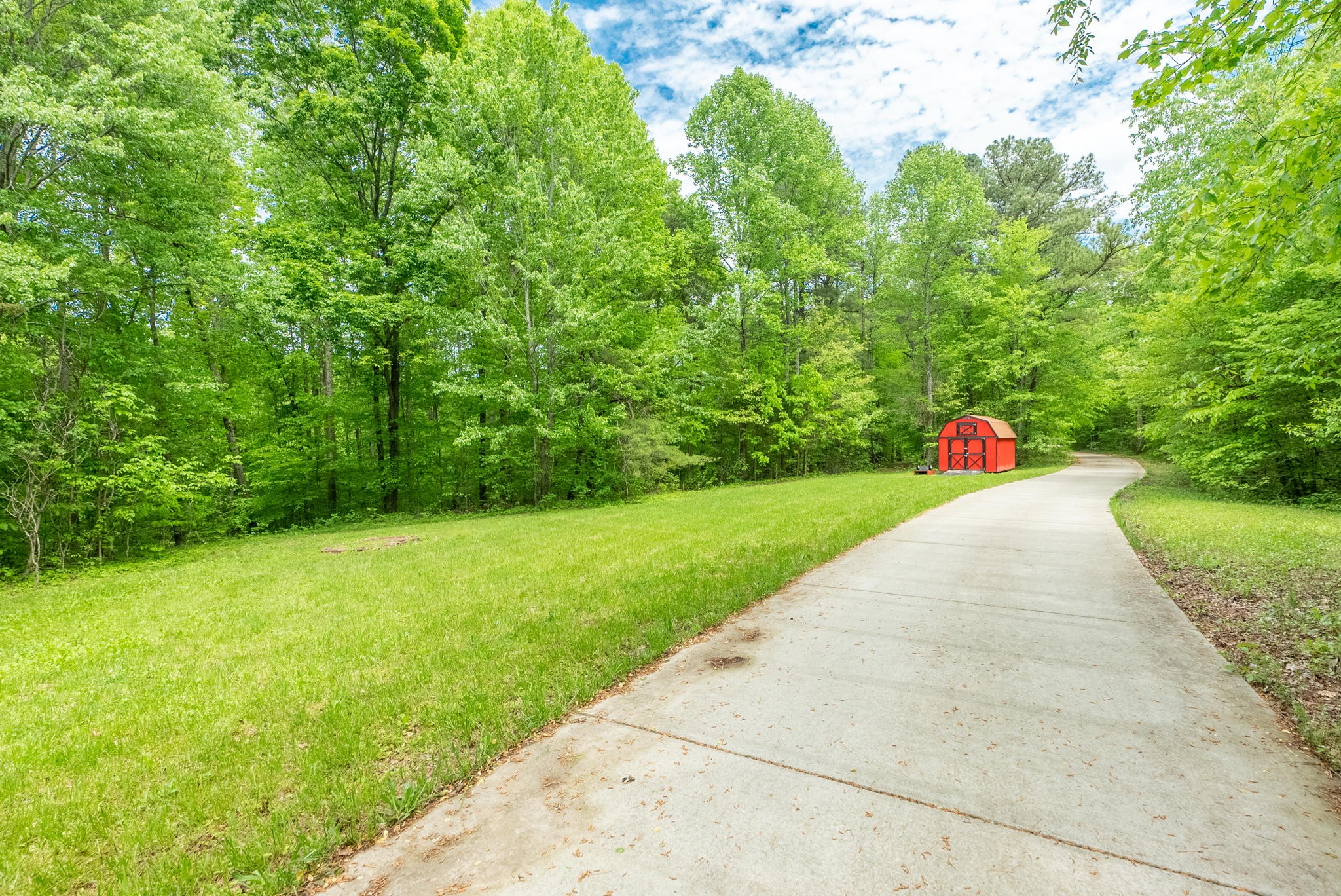 5298 Ridge Road Joelton, TN 37080 - Photo 6 of 46 a green field with trees in the background
