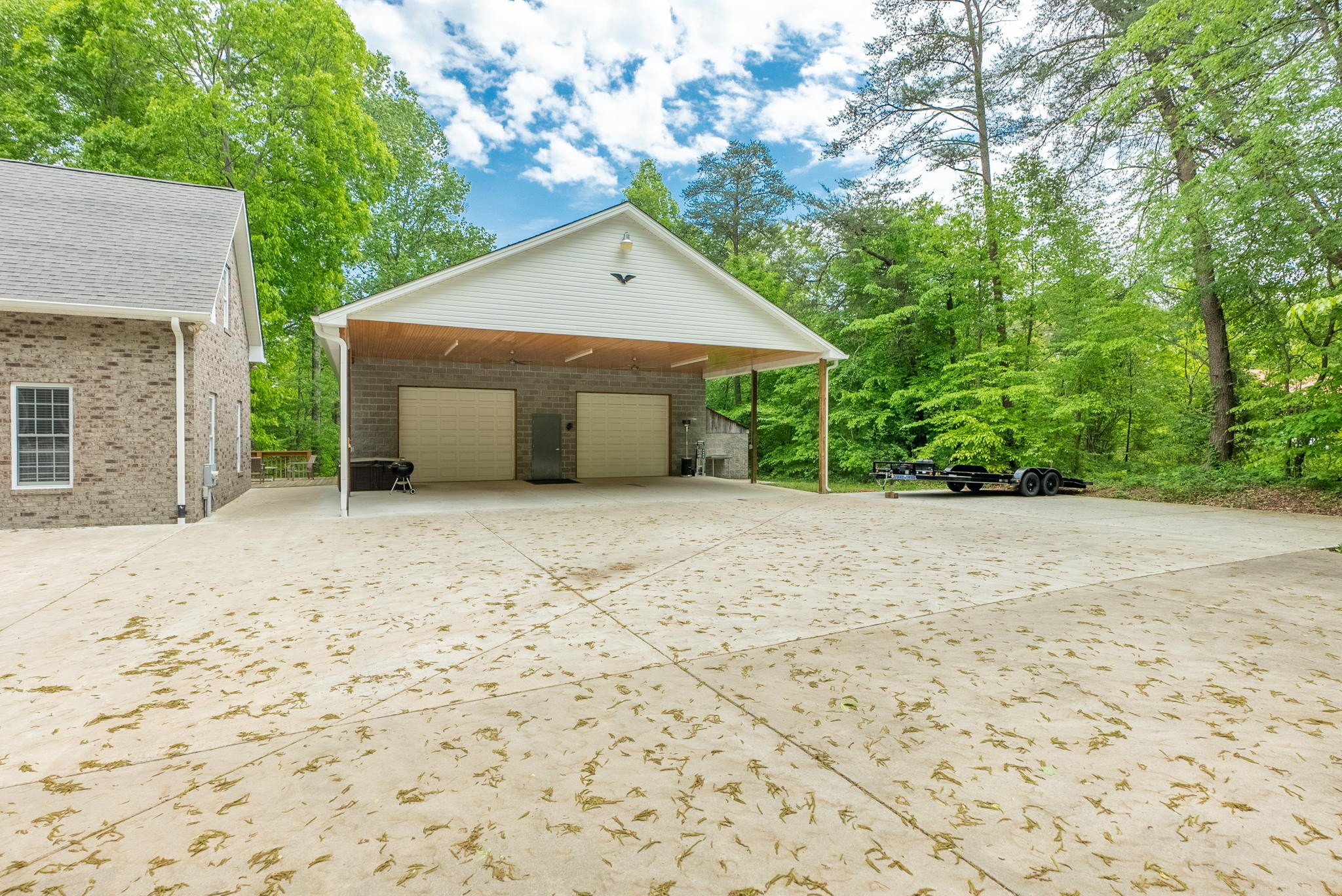 5298 Ridge Road Joelton, TN 37080 - Photo 10 of 46 a house with trees in the background